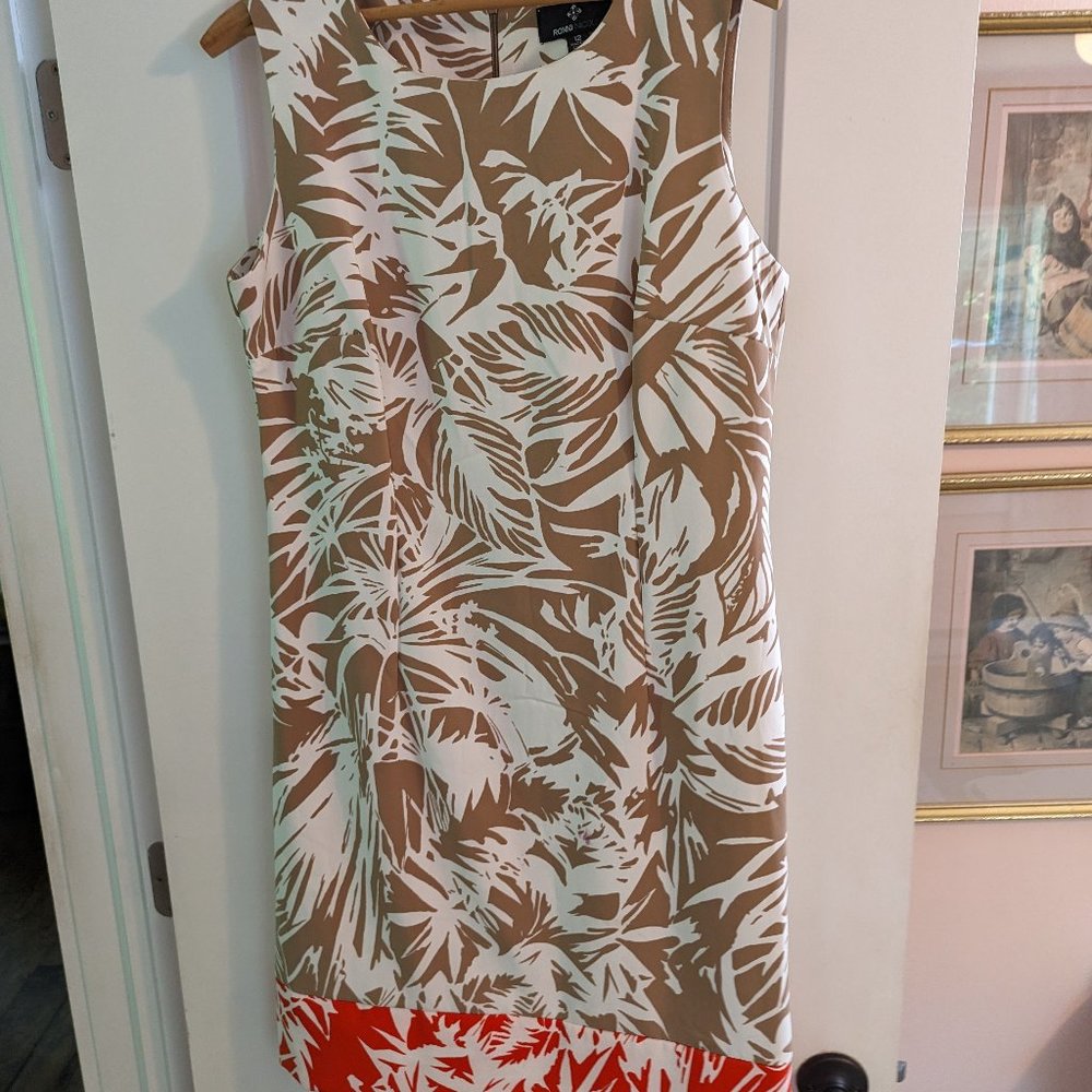 Beige and white dress.